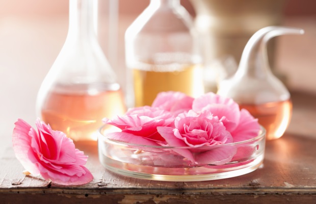 aromatherapy and alchemy with pink flowers