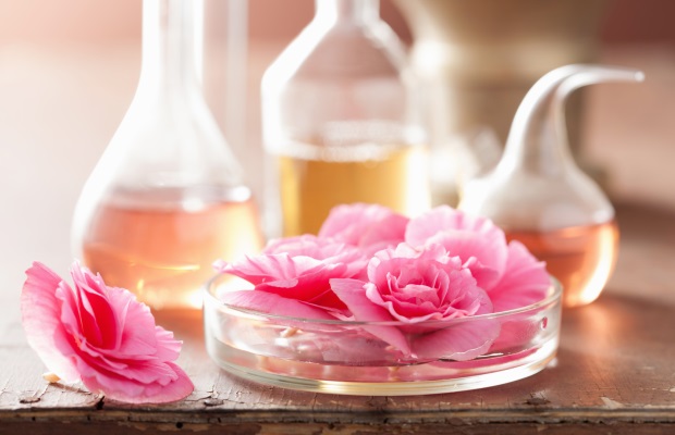 aromatherapy and alchemy with pink flowers